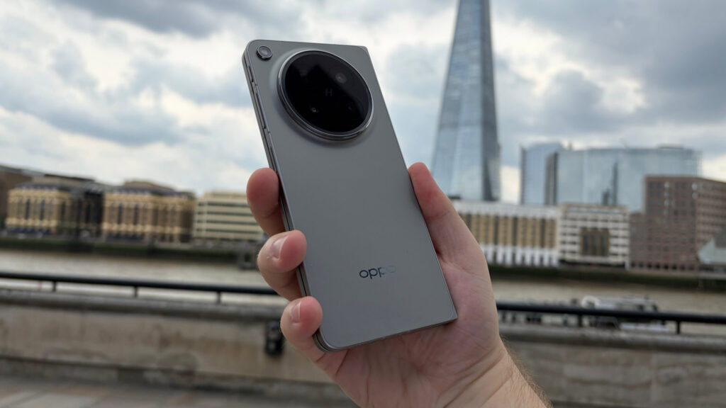 OPPO just turned up in a list no company wants to be on Someone holding the OPPO Find N6, showing the back of the phone.
