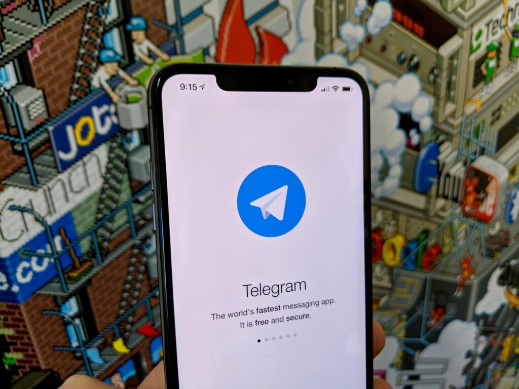 Telegram’s Brief App Store Removal Renews Questions About Apple’s CSAM Enforcement A screenshot of the Telegram app welcome screen on an iPhone.