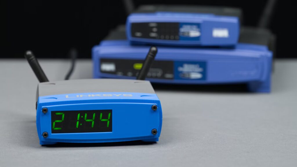 You, too, can build this cute alarm clock modeled after the classic Linksys WRT-54G router