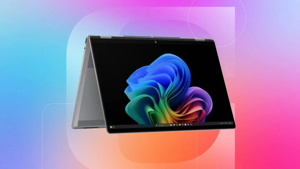 A two-in-one laptop against a blue, orange and pink gradient CNET background.