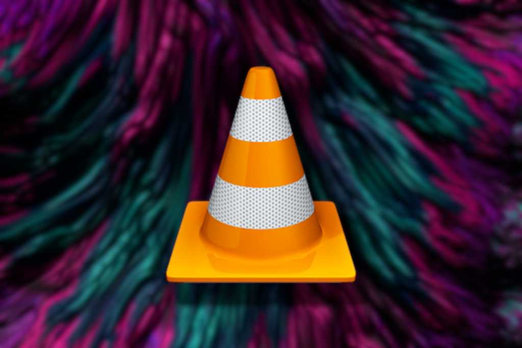 Microsoft Defender is causing slow VLC startups. Here’s the fix VLC app icon on abstract background