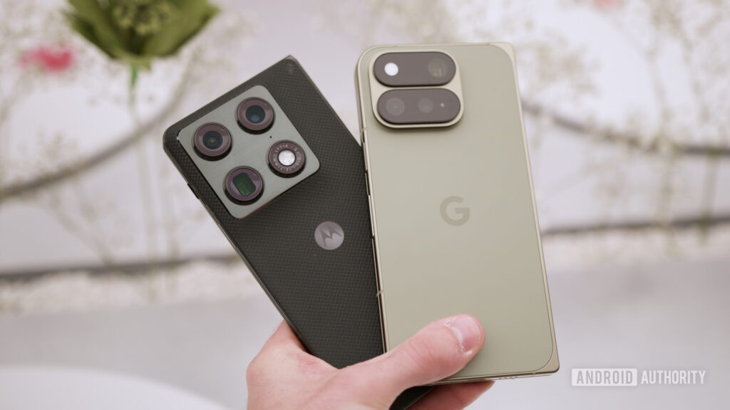 Motorola and Google foldables are quietly beating Samsung where it counts Someone holding the Motorola Razr Fold and Google Pixel 11 Pro Fold.