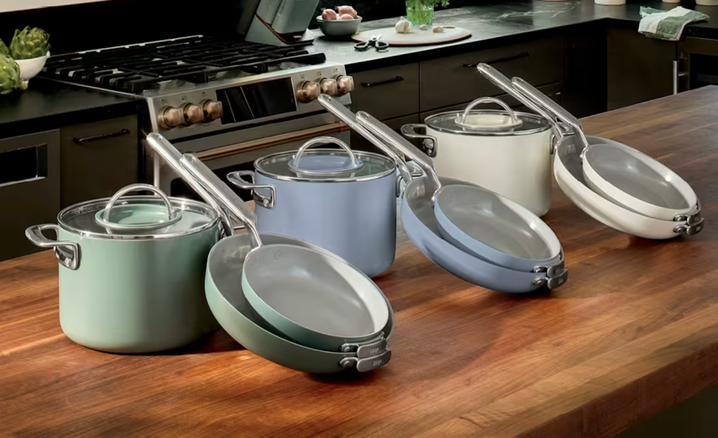 Ninja Takes on Caraway With Cheaper, ‘More Durable’ Ceramic Cookware Three sets of pans on a brown kitchen counter