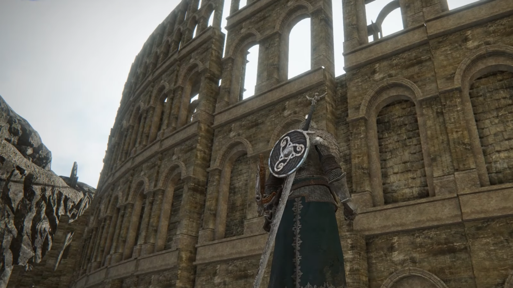 Dark Souls 2 dataminer shows off massive prototype coliseum level from early development Nightreign gameplay view of cut map from Dark Souls 2, showing Faraam Wylder looking up at the side of a massive coliseum wall.