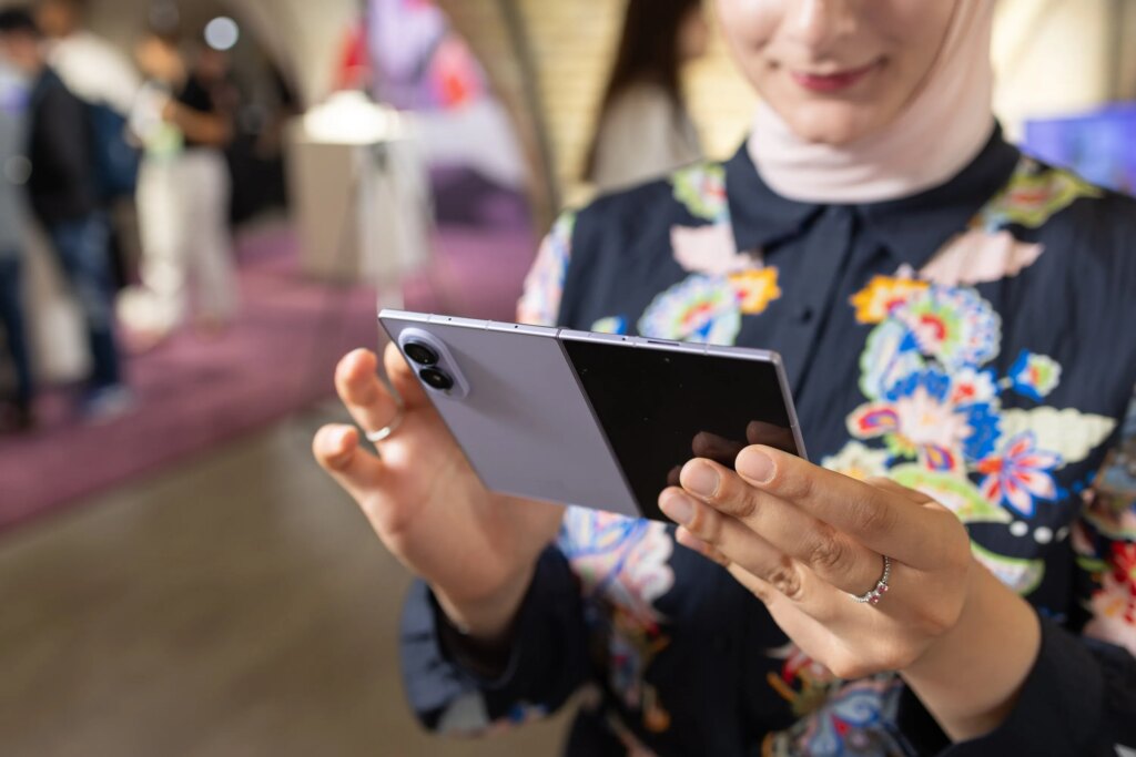 Smartphone Shipments Just Hit a New Low. Thanks, RAMageddon Abrar holding the Galaxy Z Fold 8, unfolded
