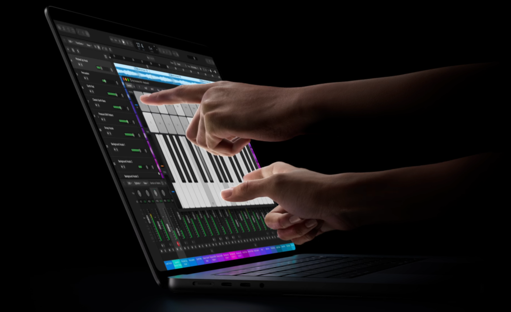 MacBook Pro with touchscreen display, where a user plays a piano on screen